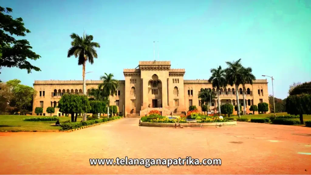 a large building with trees and a lawn